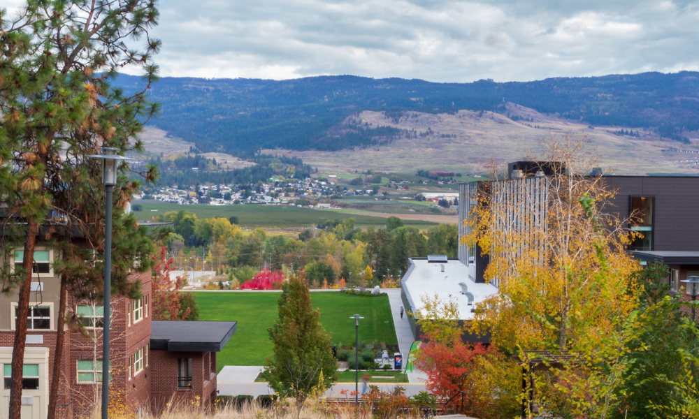 Outdoor view of UBC Okanagan campus and mountains in fall